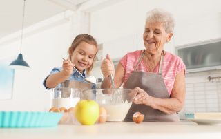 Who should supervise contact? Grandparents time with grandchildren. Accompanying picture: A girl and her grandmother cooking in kitchen
