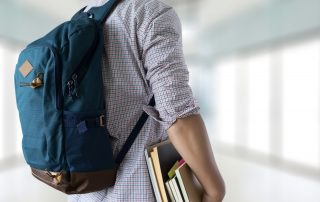 Claiming Adult Child Maintenance. Accompanying picture: mature Student with backpack go to school