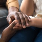 What if a parent dies before parenting arrangements are finalised? Accompanying image: father holding hands of child