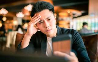 Image of a man, accompanying family law article "I don’t think I’m the father?"