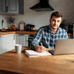 A man on a laptop, researching about family and relationship law