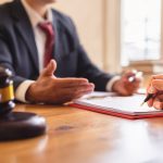 What type of lawyer do you need? Accompanying picture: co-investment business and lawyer or judge team signing contract agreement, Concepts of law, advice, legal services.