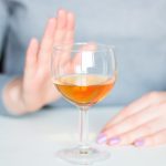 Court ordered drug testing and its impact on parenting. Accompanying picture: young woman refuses alcohol