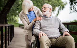 When aged care comes between couples. Accompanying picture: nice senior woman with husband in wheelchair in park
