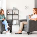 Image of a Psychologist working with teenage girl in office, accompanying article "Sharing information from your child’s psychologist in court"