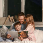 Image of father and two children accompanying family law article "Can a tightly-held belief derail your parenting?"
