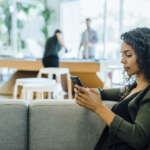 Image of a woman texting on cell phone, accompanying the family law article "Think before you text your ex"