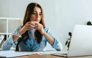 Image of a woman with cup of coffee