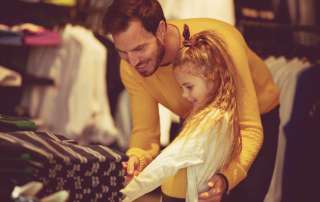 Image of a father with daughter, accompanying family law article "Tips on binding child support agreements"