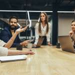 Image of people during a mediation, accompanying the family law article "Top Five Benefits of Mediation".