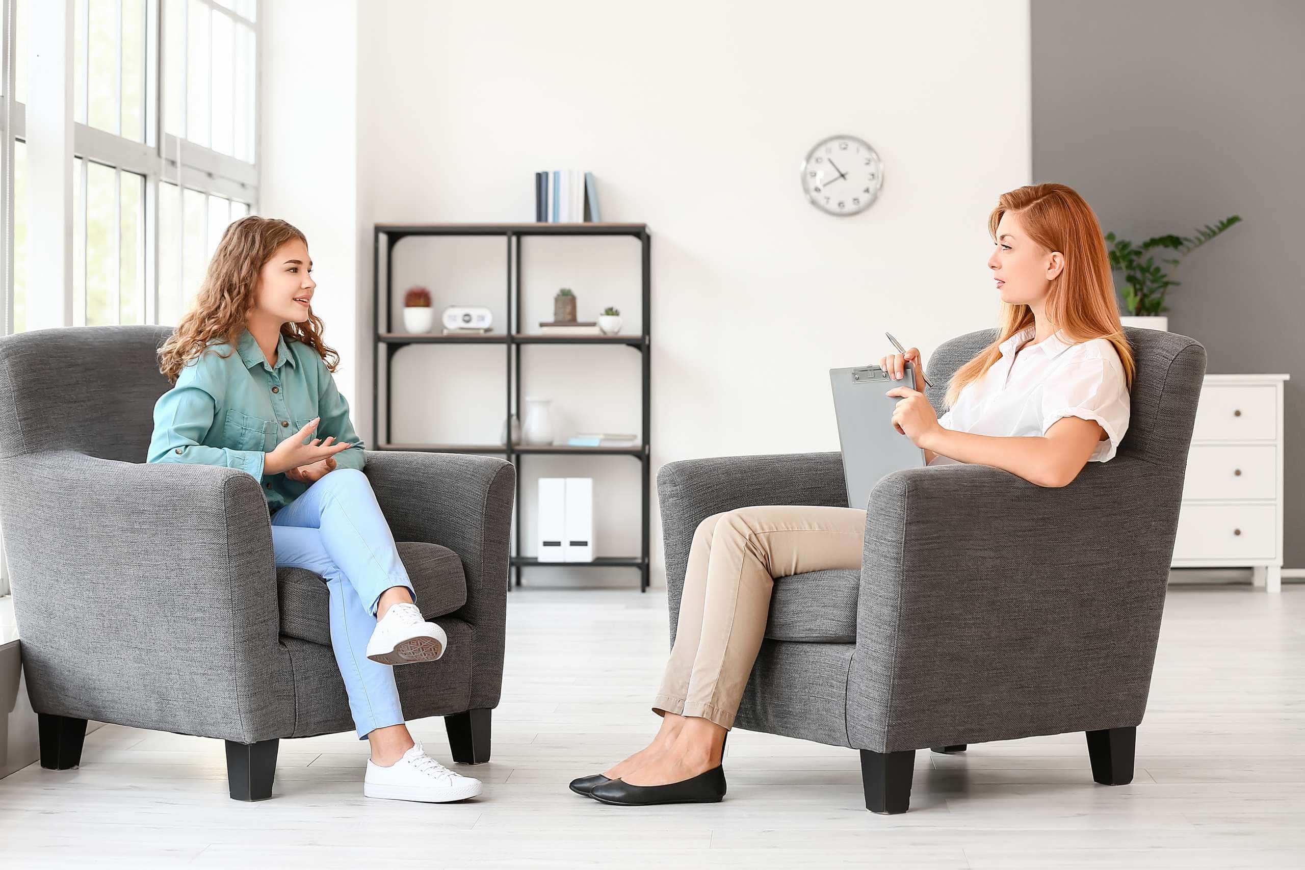 Image of a young female at a consultation with a counsellor,