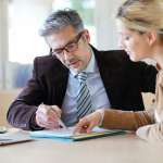 Image of a man and woman solving a problem, accompanying family law article "What is an Appeal?"