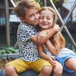 Image of two siblings accompanying family law article "Relocating with the kids – the difference between interim and final orders"
